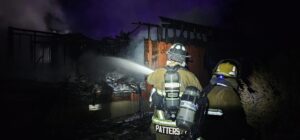 Vernon Firefighter Patters and other Firefighters Suppress the House Fire on Jan. 9-Picture by Vernon Fire District. 